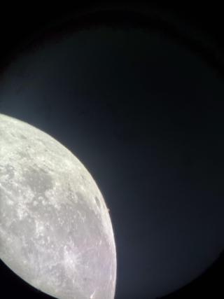 Mars falls behind the moon.
