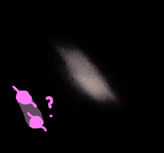 Saturn raw through my telescope. It seems weirdly smeared