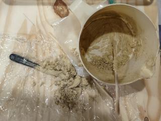 The container I mixed the dental stone in. That brown stuff hardens into a rock-like consistency, but flaked off.