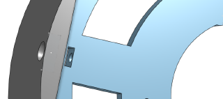 A view from below, showing how the gray edge supports attach to the cell with a screw and nut.