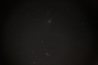 A picture of M81 and M82 galaxies, white smudges in a field of stars. Taken via pingu camera.