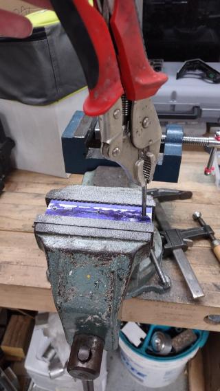 I drilled then tapped holes into the aluminum so I could insert nylon screws. That way the mirror rests on soft nylon instead of scratchy metal or wood.