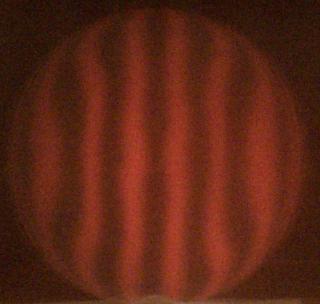 My mirror on may 7, showing an oblate spheroid: the center is flat, while there is a dip in the mirror surface at around 70% of the way from the center to the edge.