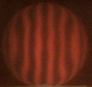 My mirror on may 7, showing an oblate spheroid: the center is flat, while there is a dip in the mirror surface at around 70% of the way from the center to the edge.